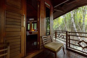 A balcony or terrace at RedDoorz Resort @ Taman Wisata Mangrove