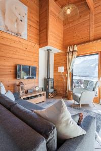 Et opholdsområde på Beautiful 2 bed Chalet Morzine