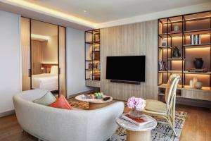 A television and/or entertainment centre at PARKROYAL Serviced Suites Jakarta