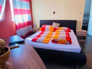 Ліжко або ліжка в номері Borostyán Apartmanház