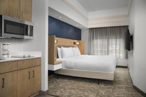 Кровать или кровати в номере SpringHill Suites by Marriott Annapolis