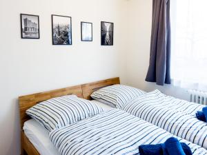 A bed or beds in a room at Basement Küchgarten