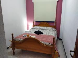 Cama ou camas em um quarto em Punta Umbría relax