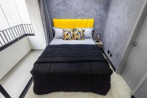 Tempat tidur dalam kamar di MY512 - Bela Vista - Studio Moderno "Próx. a Paulista"