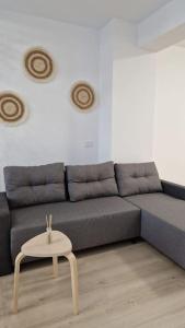 Uma área de estar em Lovely apartment in City Center