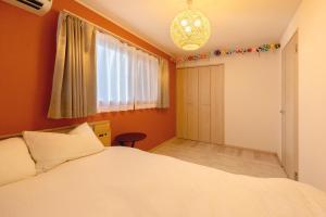 Кровать или кровати в номере CuteFamilyHouse! 8min Shinjuku 5minJR 3minSubway Cozy,Quiet KidsFree Under6yrs