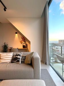 Khu vực ghế ngồi tại MOLO roof - stylish penthouse with marina view Blankenberge within walking distance from the sea - 15 km from Bruges