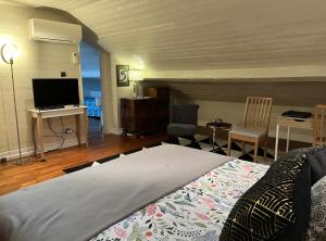 Cama ou camas em um quarto em Villa atmosphère à l'ile verte