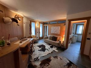 Rúm í herbergi á Appartamento incantevole con box e ski room, Wi-Fi, Bormio