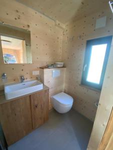 A bathroom at Unique Tiny Eco Lodges with gorgeous views to Jungfrau Massiv