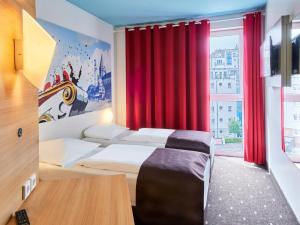 Gulta vai gultas numurā naktsmītnē B&B Hotel Mainz-Hbf