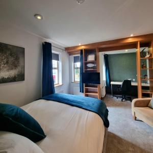 Tempat tidur dalam kamar di Brennan Court Guest Accommodation