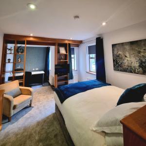 Tempat tidur dalam kamar di Brennan Court Guest Accommodation