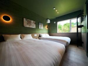 Ліжко або ліжка в номері Rakuten STAY VILLA Hakone Sengokuhara