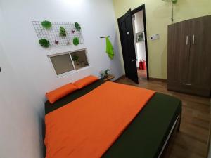 A bed or beds in a room at Homestay Xì Trum