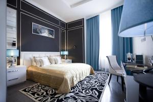 Posteľ alebo postele v izbe v ubytovaní Mirax Boutique Hotel