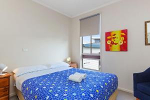 Llit o llits en una habitació de Ocean View Stay