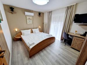 Ліжко або ліжка в номері Hotel Rheintal