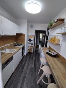 A kitchen or kitchenette at Prievidza Home