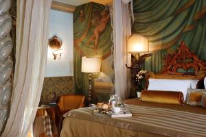 Cama ou camas em um quarto em Hotel Metropole Venezia