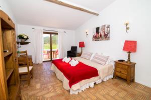 A bed or beds in a room at Casa Fajara