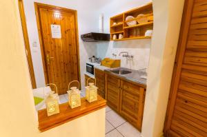 Una cocina o kitchenette en Olive Grove Studios