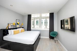 Gulta vai gultas numurā naktsmītnē Staycity Aparthotels Liverpool Waterfront