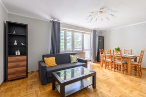 Зона вітальні в Bella Casa Premium Apartment - Biesiadna - Warszawa