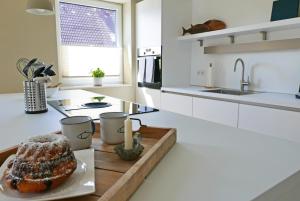 Kitchen o kitchenette sa Borbyer Perle