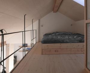 Llit o llits en una habitació de House Design Vipiteno