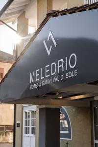 Un certificat, premiu, logo sau alt document afișat la Hotel garni Meledrio