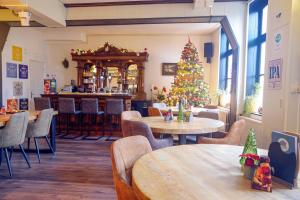 Restaurant o un lloc per menjar a Bed & Breakfast Hotel Het Gerendal