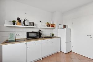 Dapur atau dapur kecil di AuraApartment - Nulandt#1