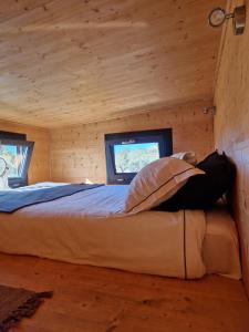 Krevet ili kreveti u jedinici u objektu Location Tiny House Loule