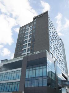 a tall building with a lot of windows at Best Western Plus Metro Clark in Angeles