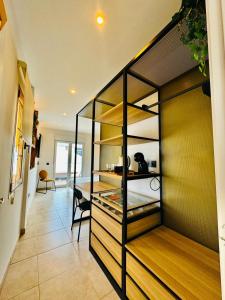 A bed or beds in a room at Lantia Rooftop House