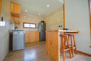 Una cocina o kitchenette en Moderna Cabaña en Villarrica