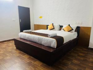 Tempat tidur dalam kamar di Pearl Villa Stay