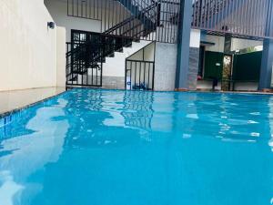 Kolam renang di atau di dekat Pearl Villa Stay