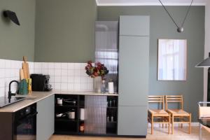 Kitchen o kitchenette sa Design Apartments Weimar Altstadt