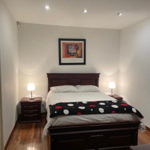 A bed or beds in a room at Floralia Casa Boutique