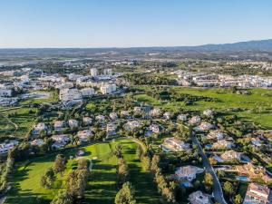 an aerial view of a city with houses at Alcore Luxury Golf Villa at Alto Golf Alvor in Alvor