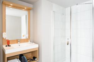 Aparthotel Adagio Access Paris Massy Gare tesisinde bir banyo