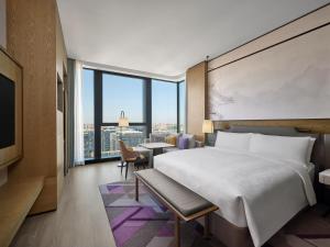 เตียงในห้องที่ JW Marriott Hotel Xi'an Southwest