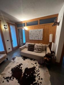 Rúm í herbergi á Appartamento incantevole con box e ski room, Wi-Fi, Bormio