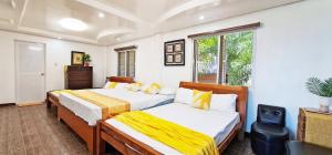 Tempat tidur dalam kamar di Dreamland Paradise Resort