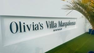 ein Schild für die olivialen Villa Masvolinos in der Unterkunft Villa Olivia Maspalomas with private pool in Maspalomas