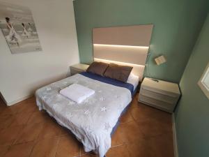 Krevet ili kreveti u jedinici u objektu Hotel Aveiro Praia