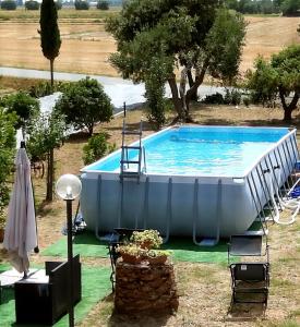 A piscina localizada em Agriturismo Stella Marina ou nos arredores