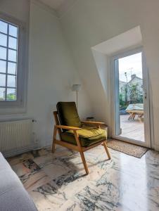 Setusvæði á Appartement lumineux avec terrasse à 7min de Paris